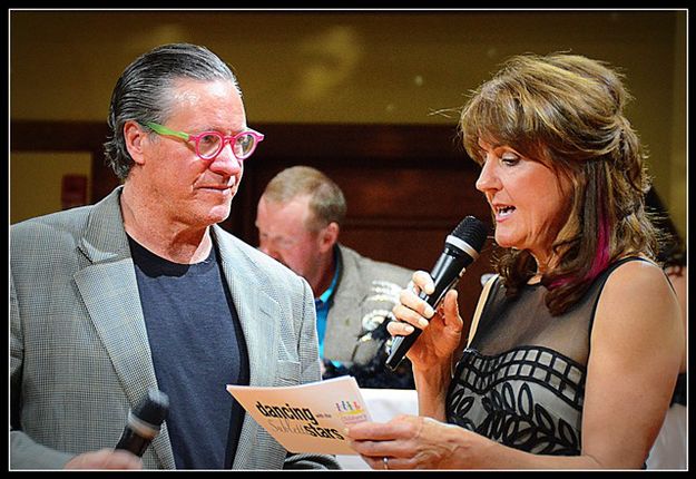 Ward and Sue Read Dancer's Bio's. Photo by Terry Allen.