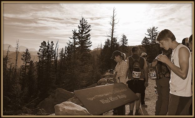 Athletes Check Their Compass Headings. Photo by Terry Allen.