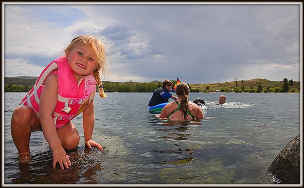 Swimming is Always Good for Kids and Dogs. Photo by Terry Allen.