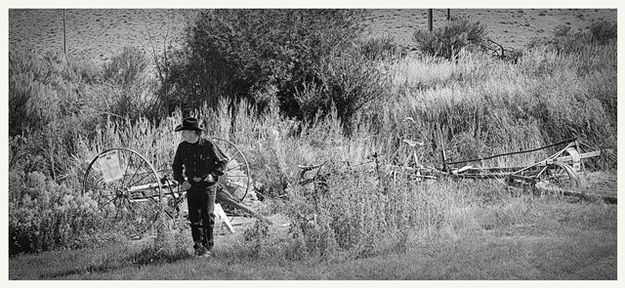 Rocky Inspects Old Equipment. Photo by Terry Allen.