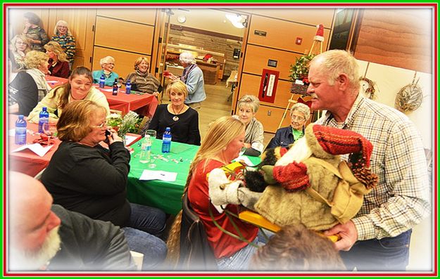 Giving a Bidder a Closer Look. Photo by Terry Allen.