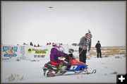 Koral Gets the Checkered Flag. Photo by Terry Allen.