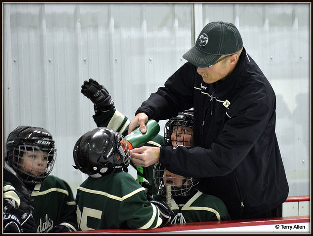 Ty Keeping Them Hydrated. Photo by Terry Allen.