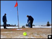 Mike Harker Putts. Photo by Terry Allen.