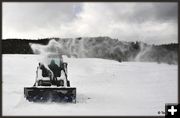 Keeping the Drifts Cleared. Photo by Terry Allen.