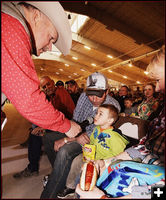 Dillon Edwards Gets a Prize. Photo by Terry Allen.