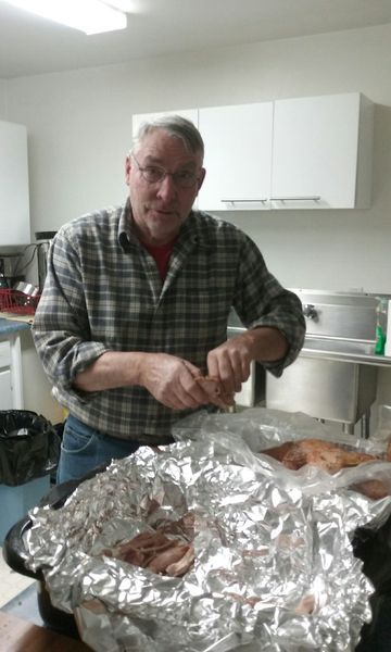 Preparing the meat. Photo by Jocelyn Moore.