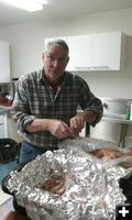 Preparing the meat. Photo by Jocelyn Moore.