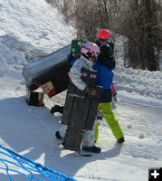 Picking up the pieces. Photo by Dawn Ballou, Pinedale Online.