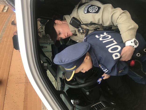 In the big patrol car. Photo by Sublette County Sheriff's Office.