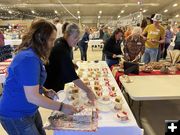 Serving cake. Photo by Sublette County Centennial.