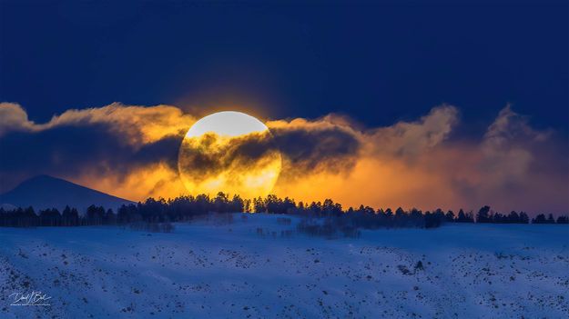 Cold Full Snow Moon Rising Over Half Moon Mountain. Photo by Dave Bell.